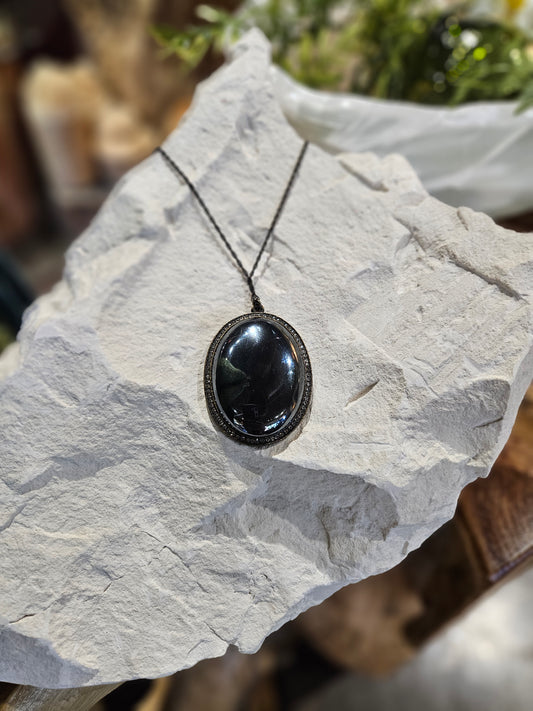 Crystal Encrusted Hematite Cabochon Necklace.